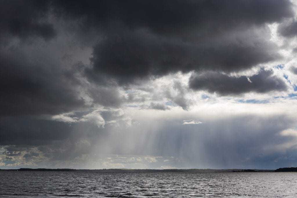 Stormy Lake Landscape With Yachts On Water. - Lifesecure